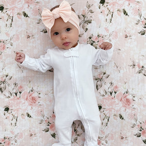 Organic zipper footie G.O.T.S certified white gender neutral baby sleeper blush pink bow headband
